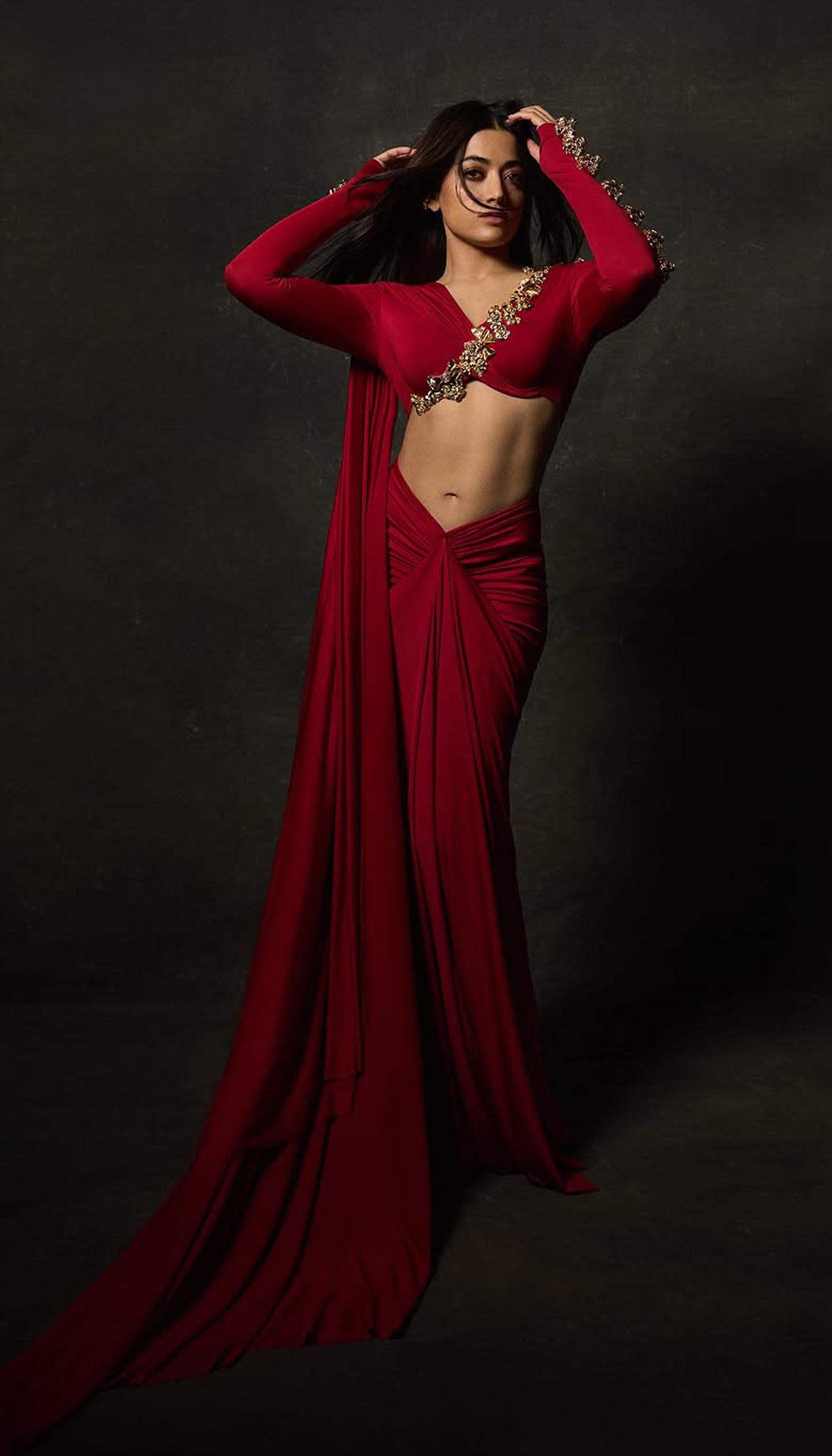 Rashmika Mandanna in crimson ember