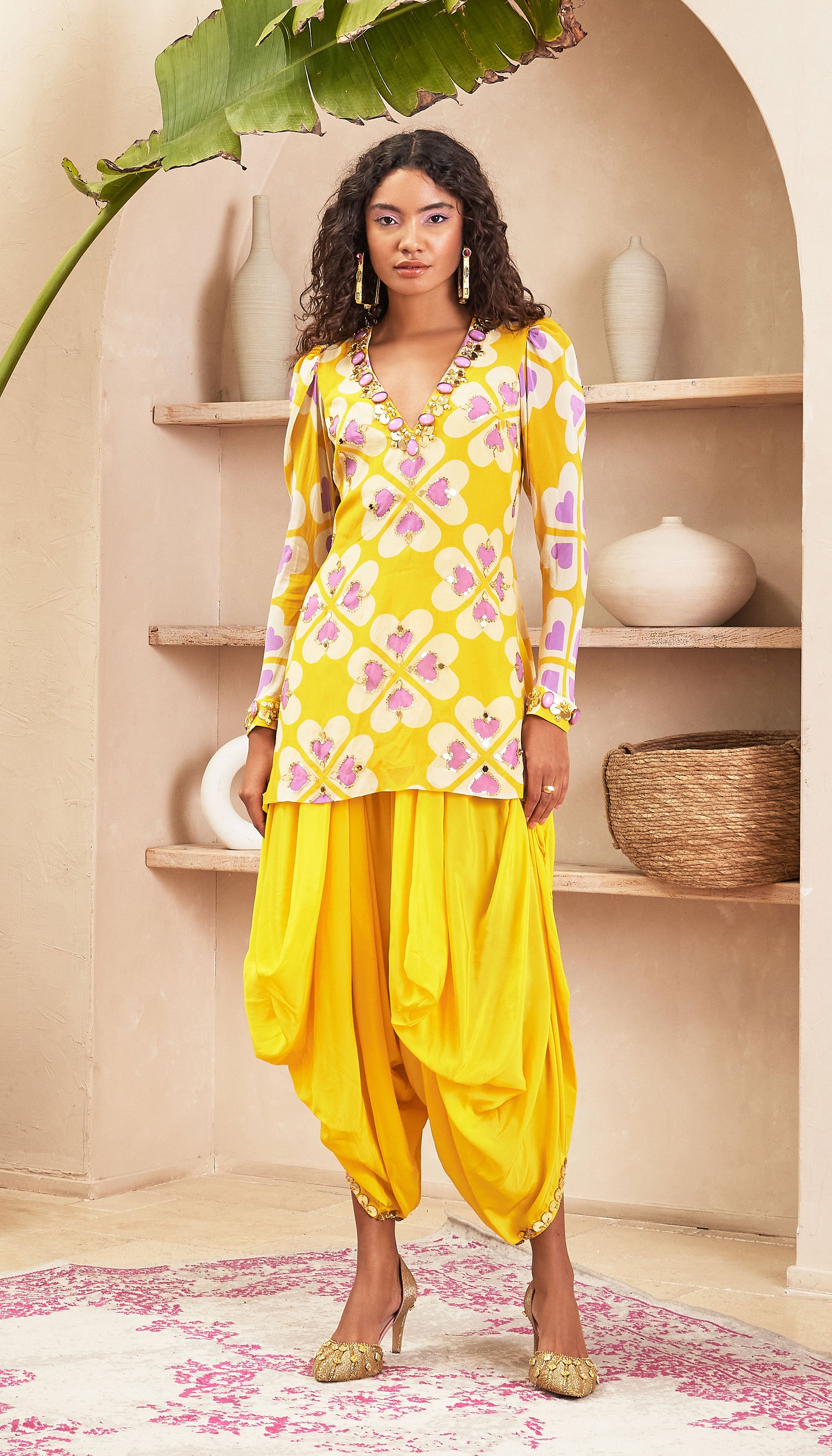 The yellow dhoti set features intricate sequins embroidery on its neckline  and bell shaped long... | Aza fashion, Dhoti pants, Fashion
