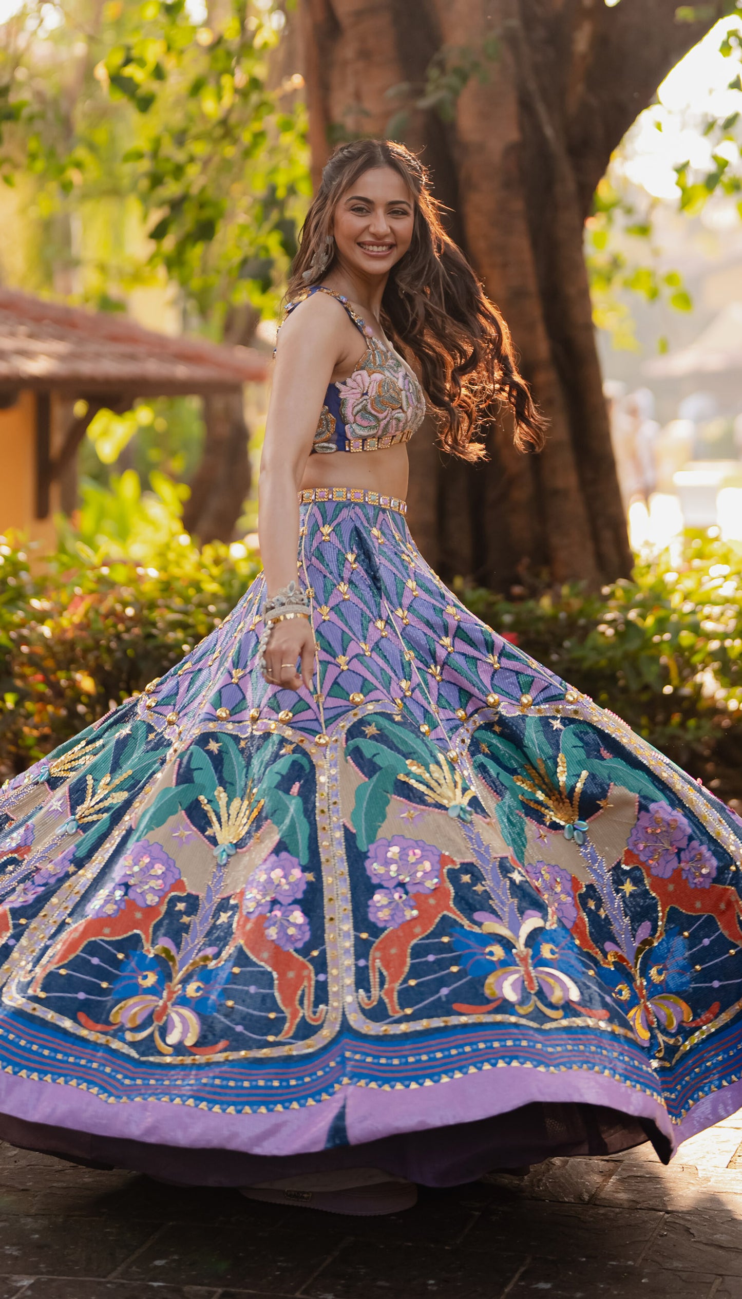 RAKUL IN LYONS- TROPICAL BLUE PRINTED AND EMBELLISHED FULL LEHENGA