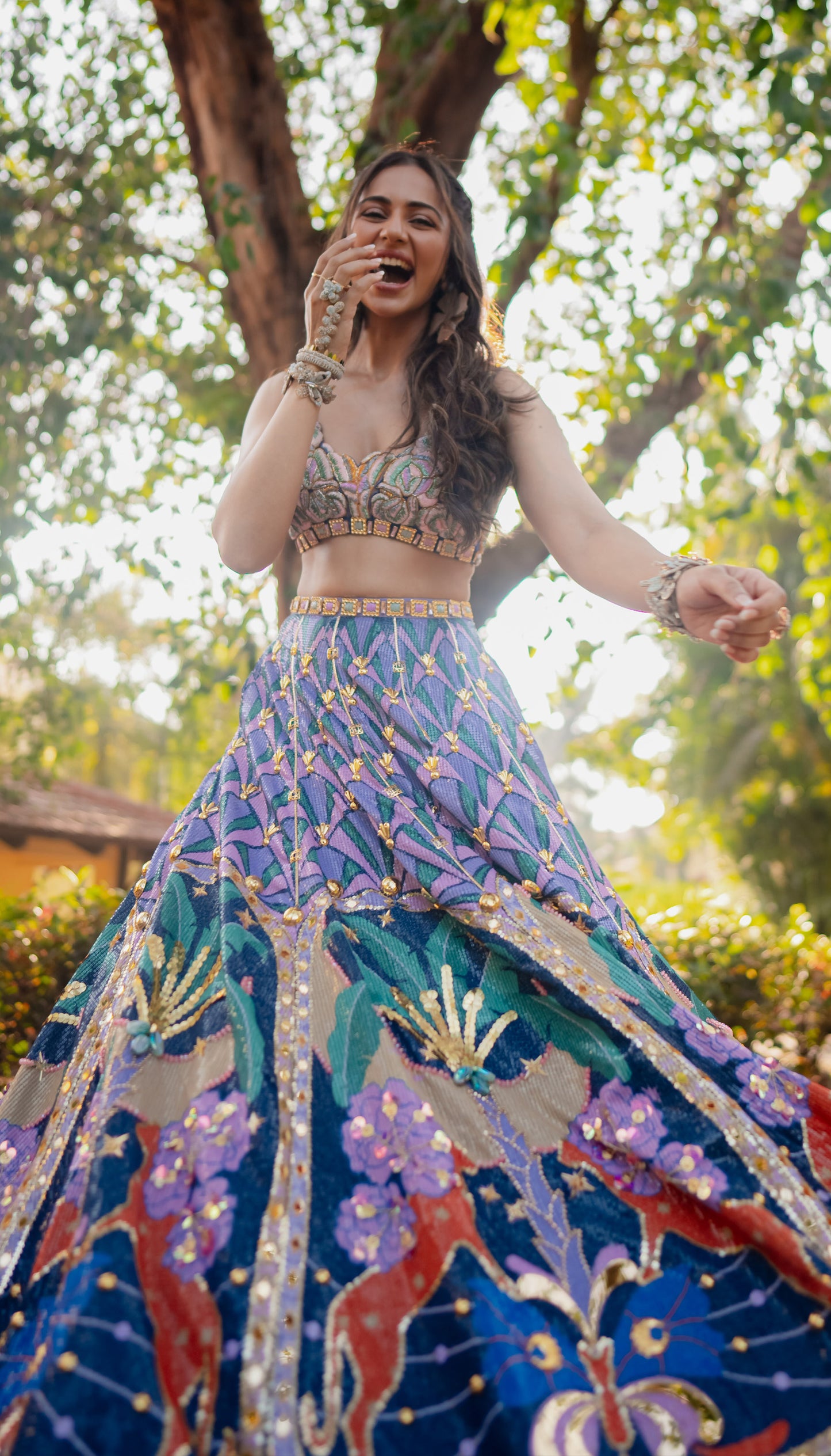RAKUL IN LYONS- TROPICAL BLUE PRINTED AND EMBELLISHED FULL LEHENGA