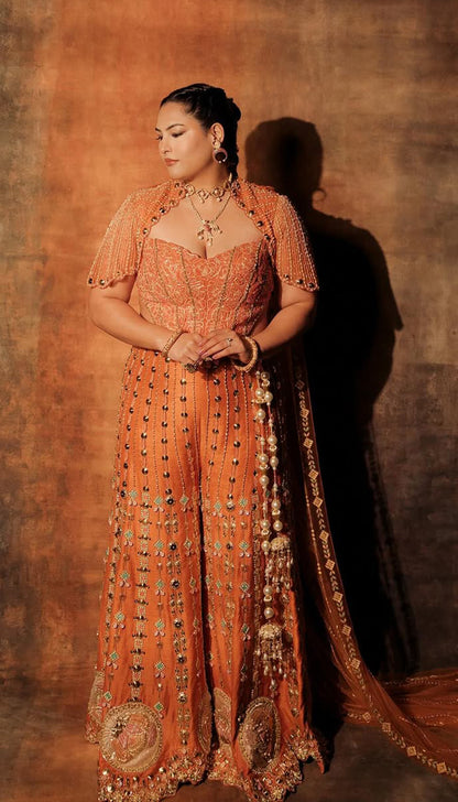 SAKSHI IN CEO OF ART - ORANGE SHARARA SET