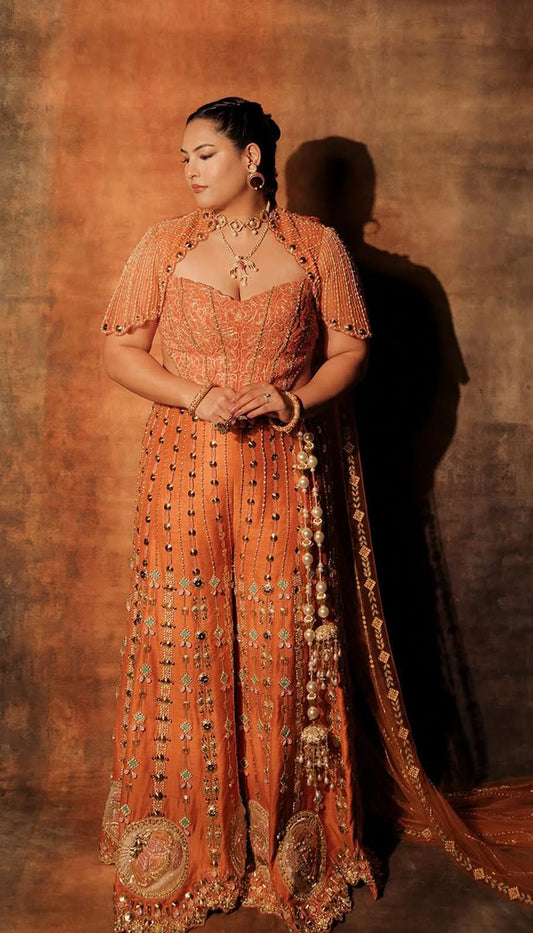 SAKSHI IN CEO OF ART - ORANGE SHARARA SET
