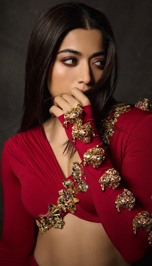 Rashmika Mandanna in crimson ember